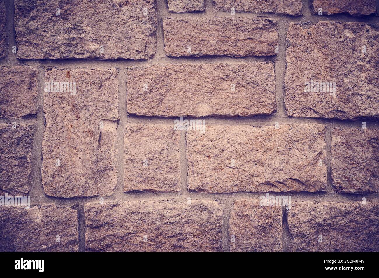 Partie d'un vieux mur de pierre en France comme photo de fond Banque D'Images