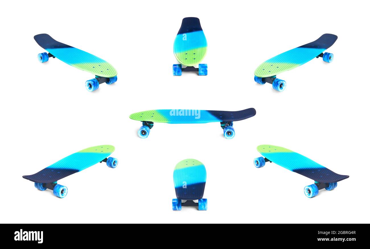 Ensemble de planche à roulettes en plastique arc-en-ciel Penny, isolée sur du blanc Banque D'Images