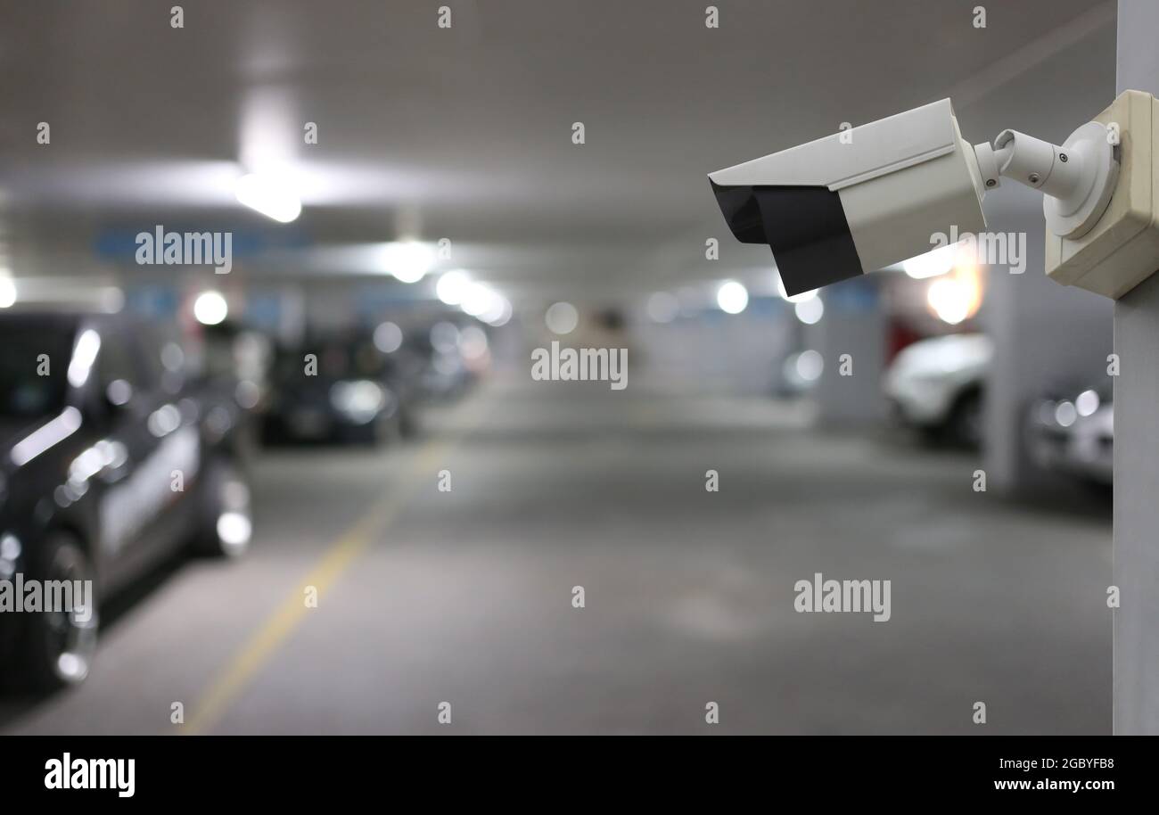 Outil CCTV sur fond de parking de voiture, équipement pour les systèmes de sécurité et ont un espace de copie pour la conception. Banque D'Images