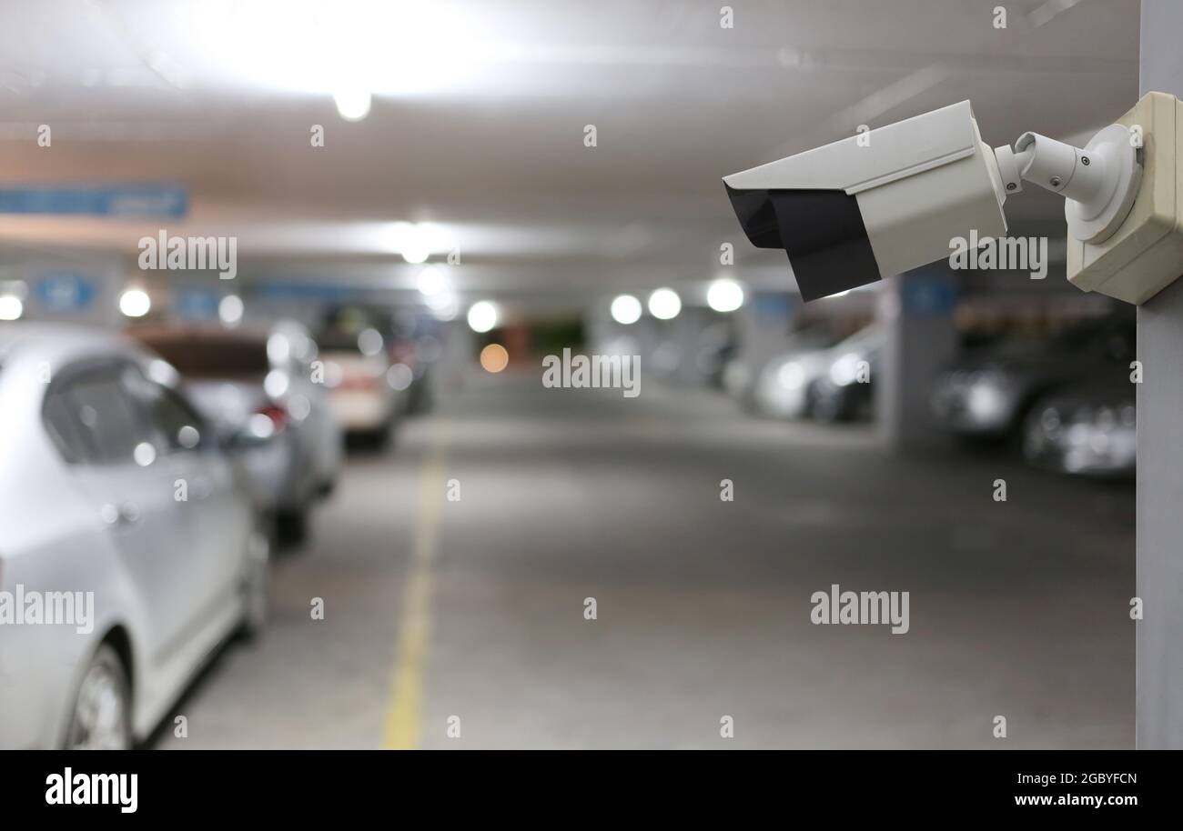 Outil CCTV sur fond de parking de voiture, équipement pour les systèmes de sécurité et ont un espace de copie pour la conception. Banque D'Images
