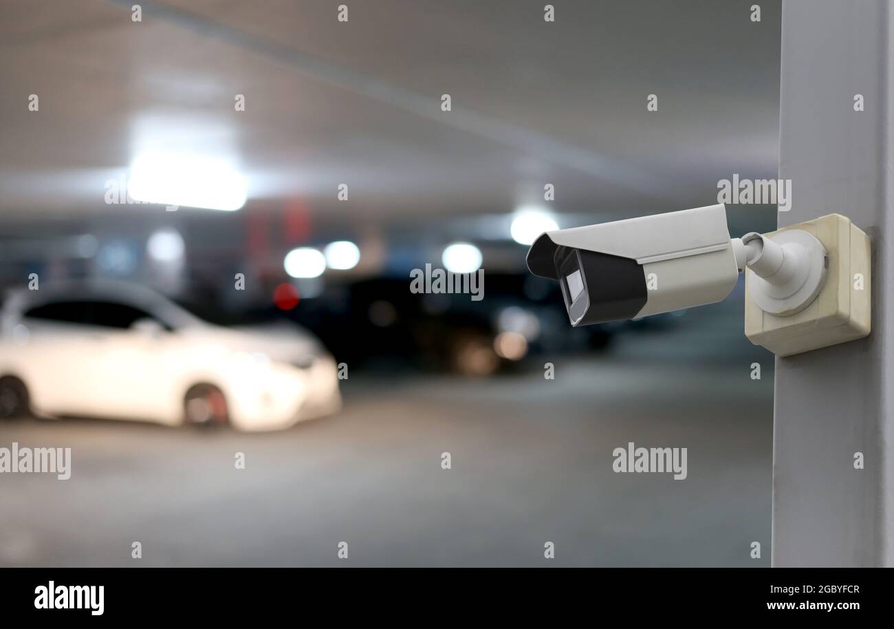 Outil CCTV sur fond de parking de voiture, équipement pour les systèmes de sécurité et ont un espace de copie pour la conception. Banque D'Images