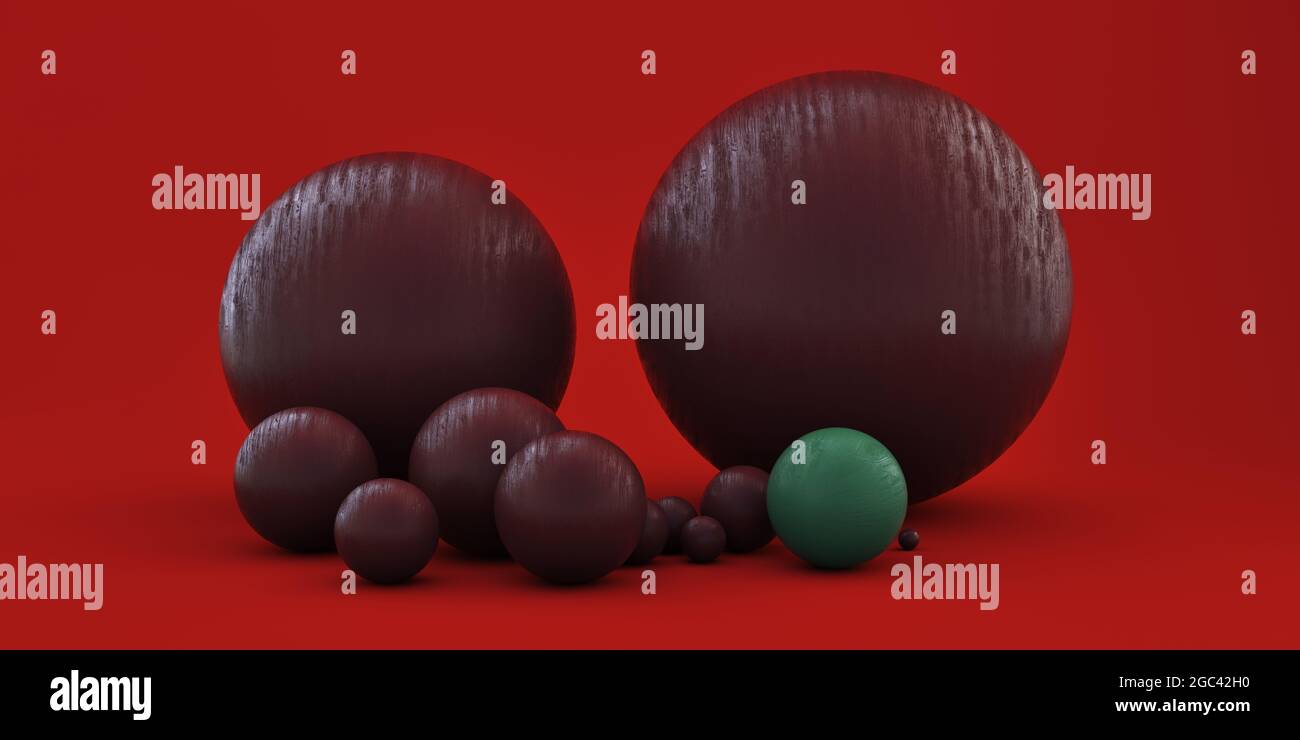Boules géométriques de différentes tailles sur fond rouge Banque D'Images