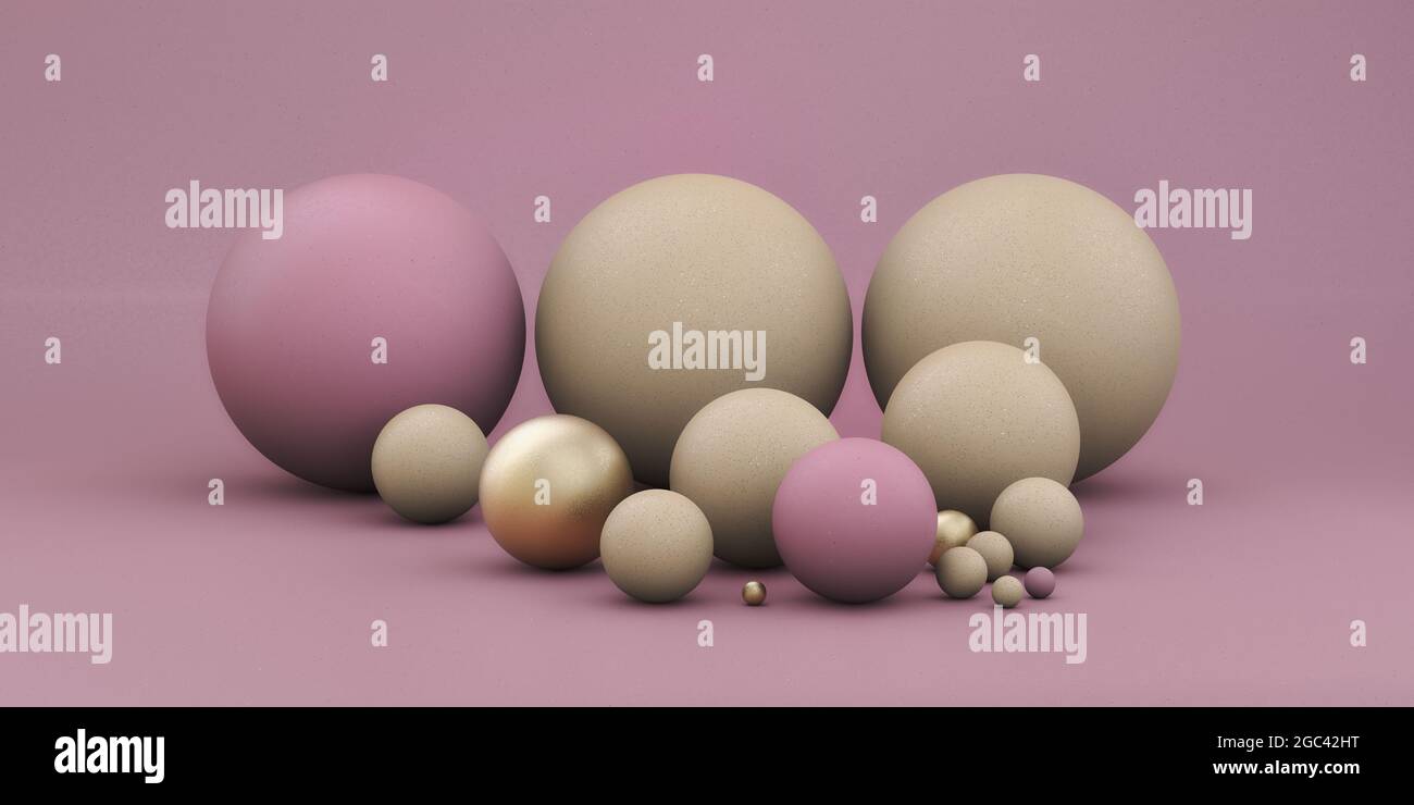 Boules géométriques de différentes tailles sur fond rose et lumineux Banque D'Images