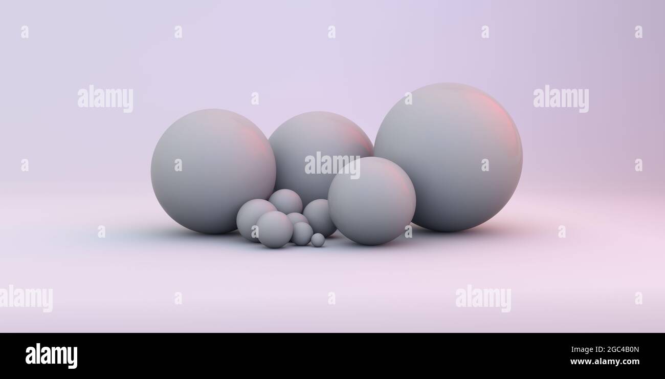 Boules géométriques de différentes tailles sur un fond blanc et lumineux Banque D'Images