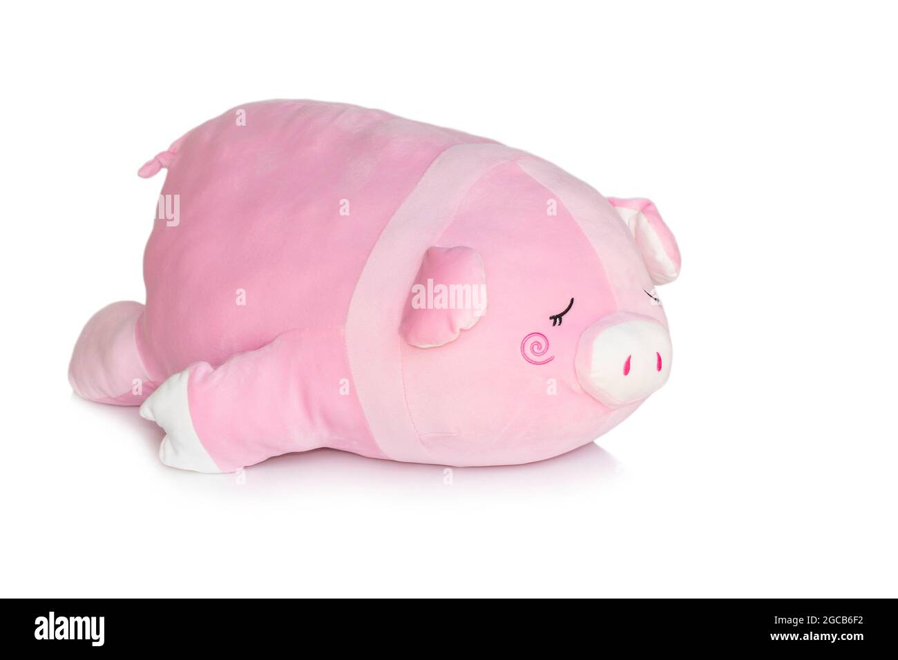 Image de poupée de porc rose isolée sur fond blanc. Poupées animales. Banque D'Images