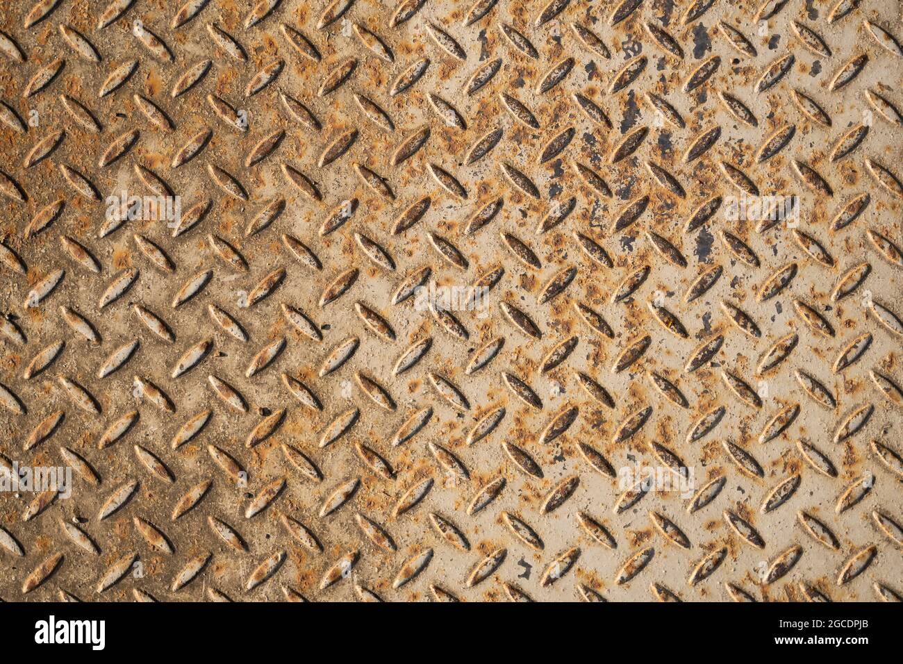 Texture de la plaque métallique rouillée du sol. Banque D'Images