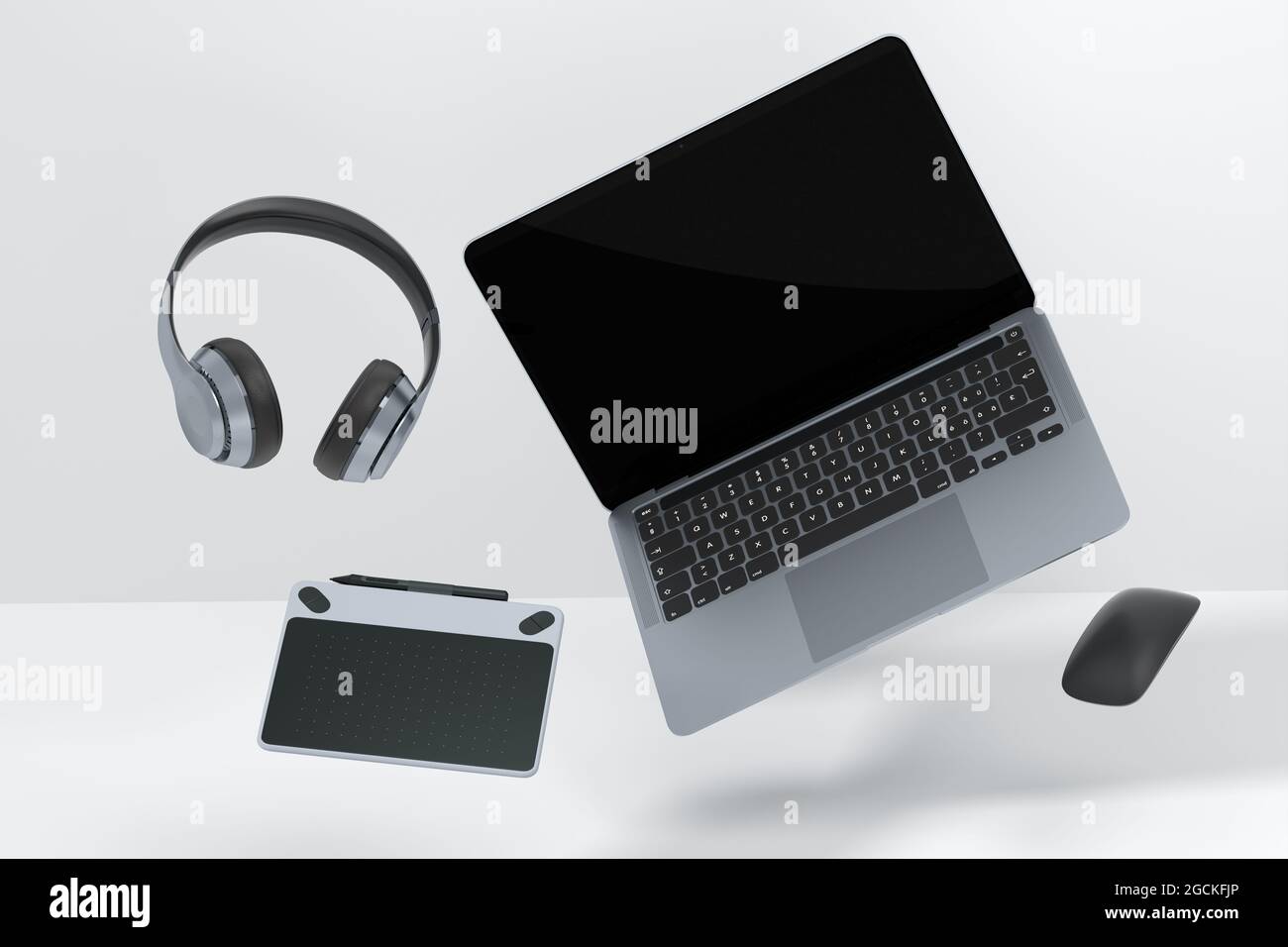 Ordinateur portable en aluminium réaliste avec tablette graphique, souris  et casque sur fond blanc Photo Stock - Alamy
