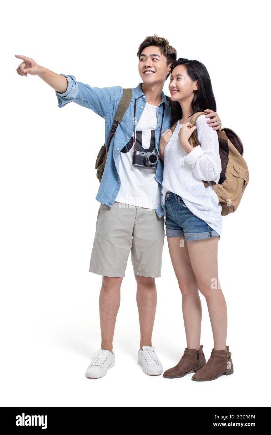 Un jeune couple heureux voyageant ensemble Banque D'Images