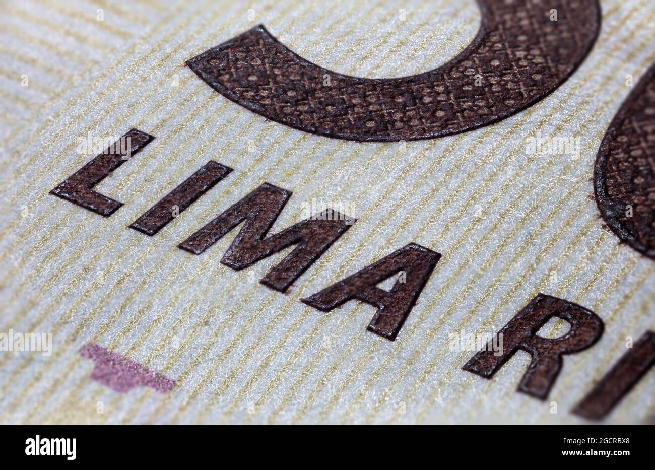 Photographie macro d'un billet Rupiah 5000. Gros plan sur l'argent indonésien. Billet de banque de l'Indonésie. L'argent de l'Indonésie a une très faible valeur et Banque D'Images