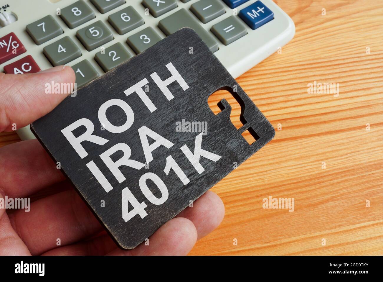 Choix entre le régime de retraite Roth IRA ou 401k. Banque D'Images