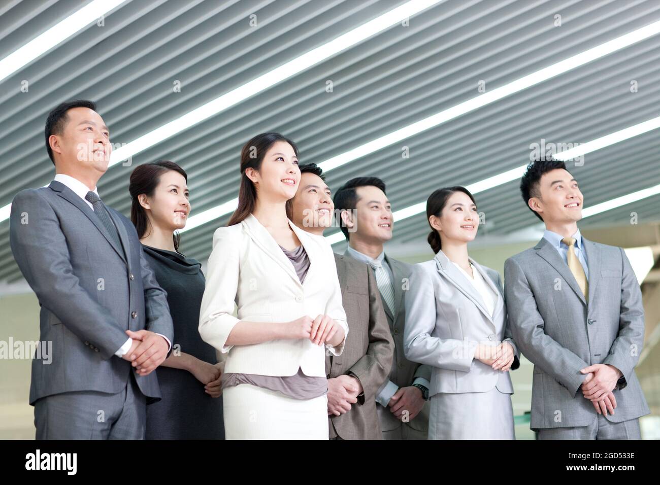 Confident business team looking at view Banque D'Images