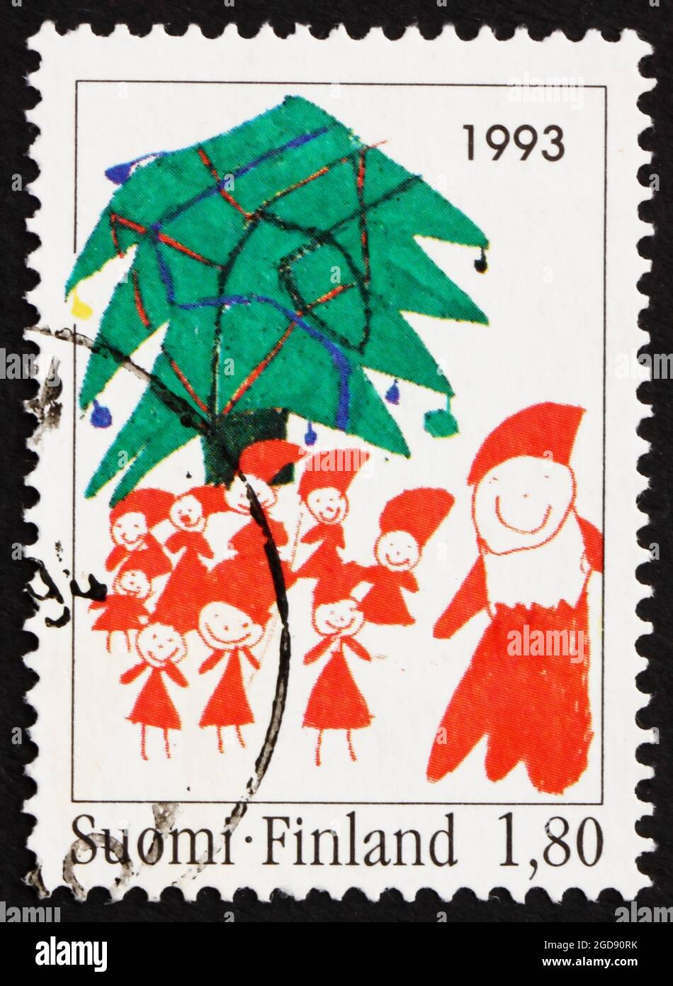 FINLANDE - VERS 1993 : un timbre imprimé en Finlande montre le Père Noël et l'arbre de Noël, dessin pour enfants, Noël, vers 1993 Banque D'Images