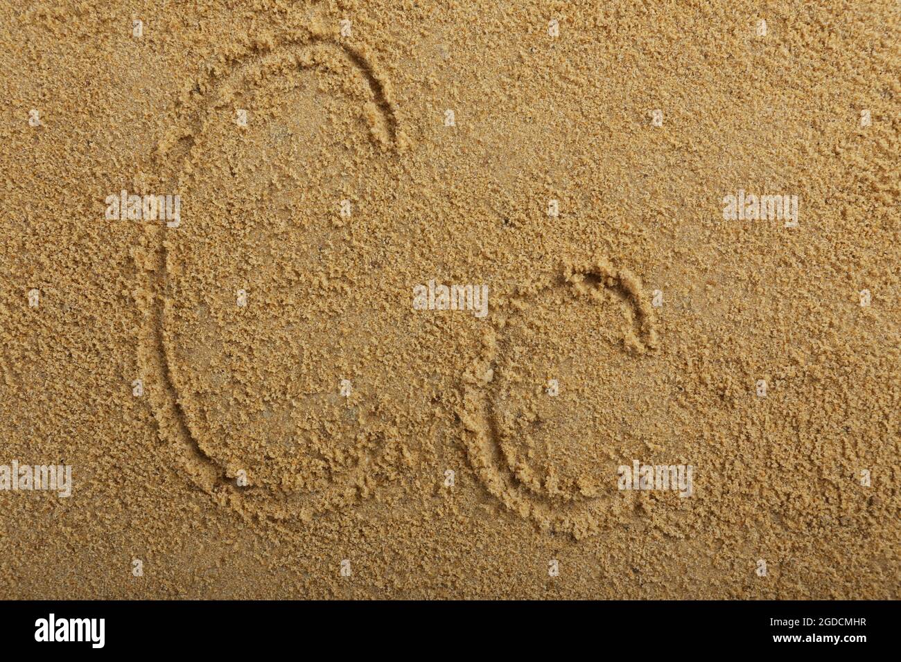 Lettre de l'Alphabet écrites sur du sable de plage humide Photo Stock