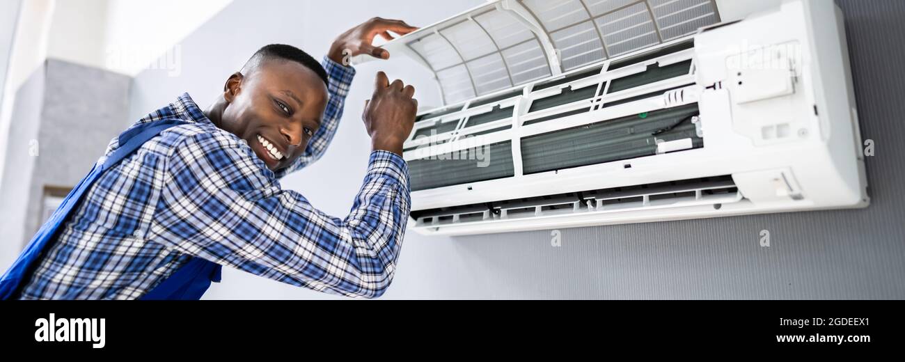 Technicien en électricité du secteur, réparation de l'appareil de  climatisation Photo Stock - Alamy