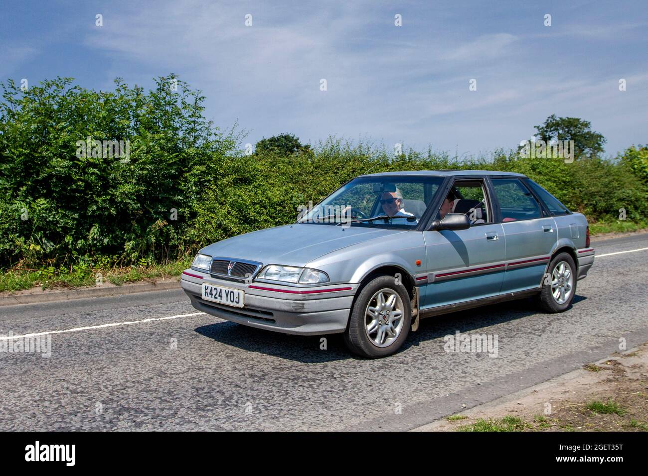 1993 90s Blue Rover GSI 1 vitesse CVT 1396cc berline essence en route vers  Capesthorne Hall Classic July car show, Cheshire, Royaume-Uni Photo Stock -  Alamy