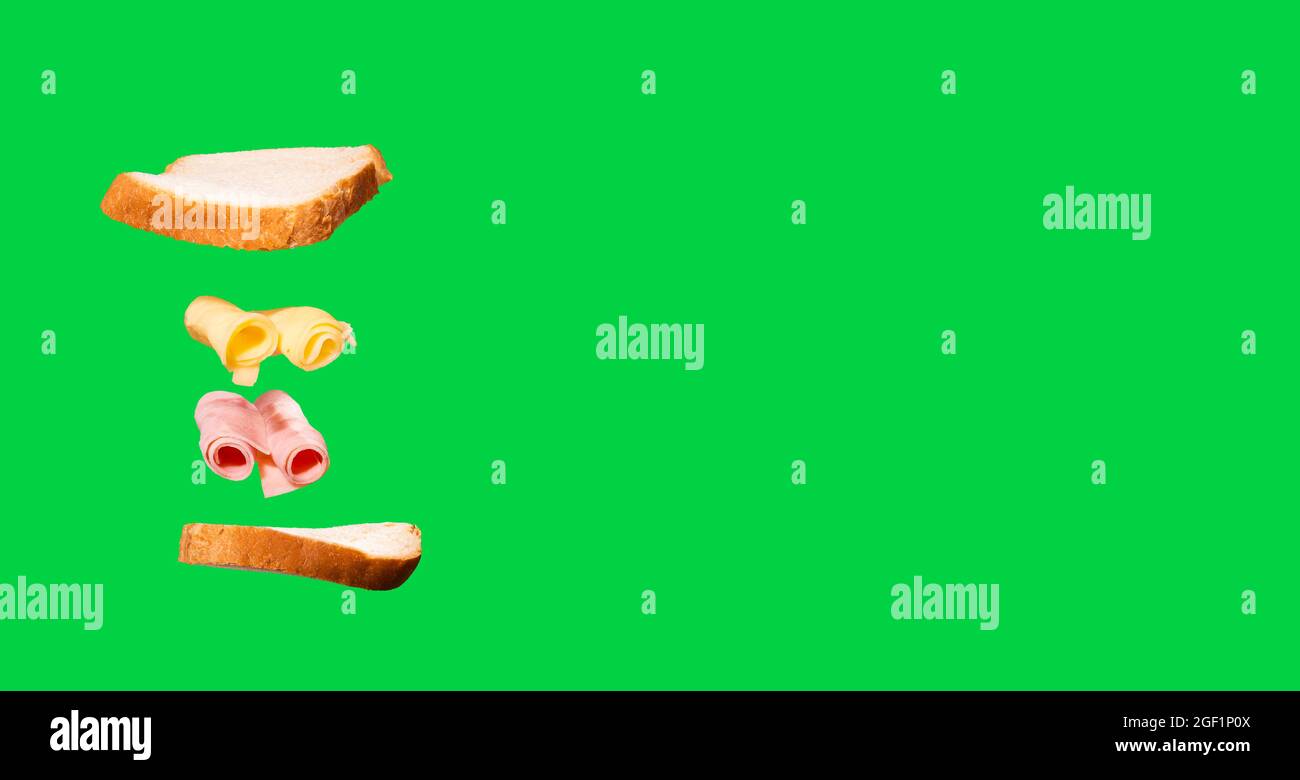 Sandwich au jambon et au fromage, avec des couches volantes. Banque D'Images