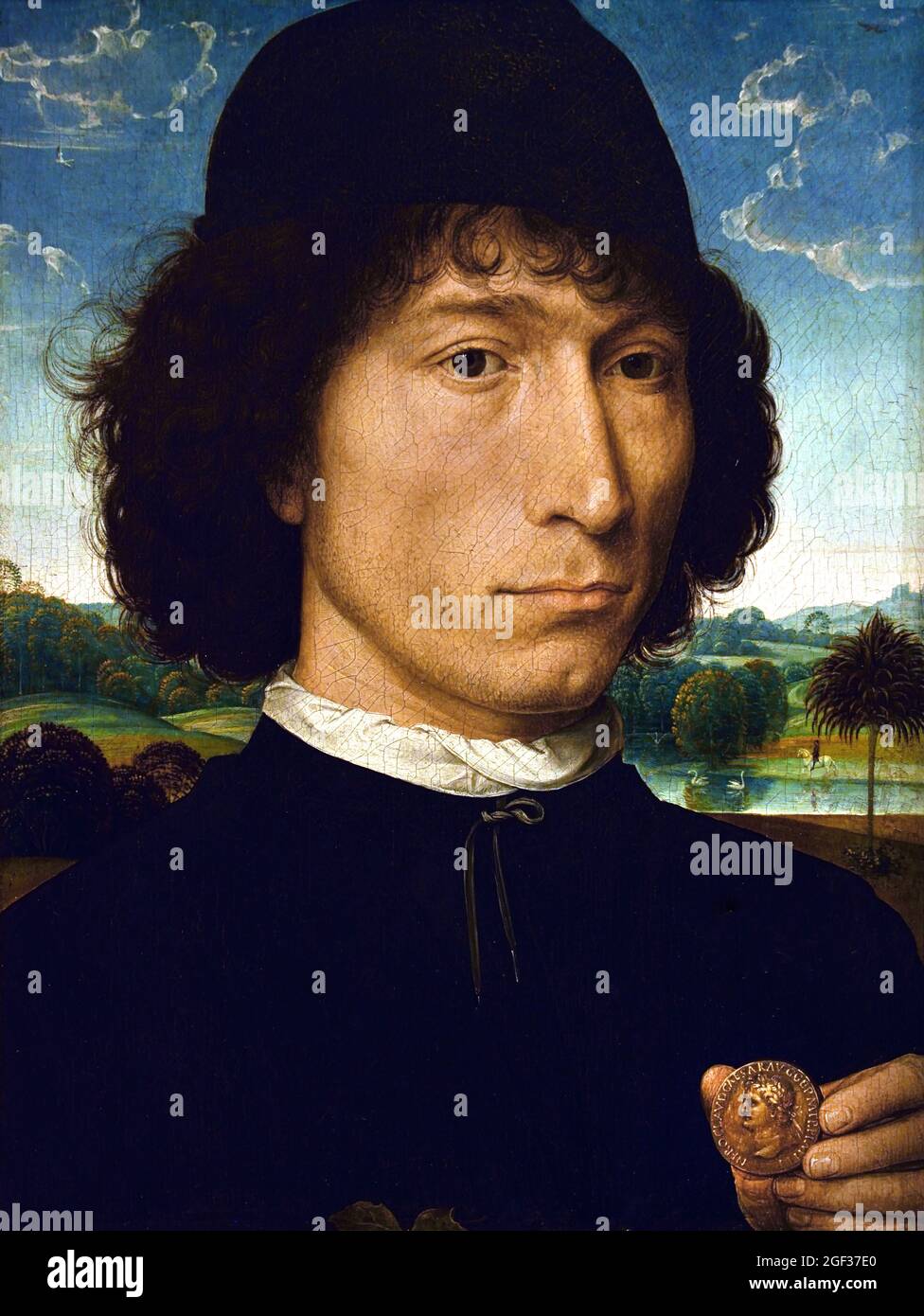 Le portrait d'un homme avec une médaille romaine 1480 huile sur panneau 31 cm × 23,2 cm artiste flamand d'origine allemande Hans Memling 1439-1494 Allemand, Allemagne, Belgique, Flamand, Hans Memling (c. 1430–1494) est un peintre germano-flamand de la tradition néerlandaise, connu pour ses œuvres religieuses et ses portraits révolutionnaires de la classe marchande émergente, qui ont apporté sa réputation internationale et son influence en Italie. Il était un artiste à succès qui était parmi les citoyens les plus riches de la ville de Bruges à sa mort Banque D'Images