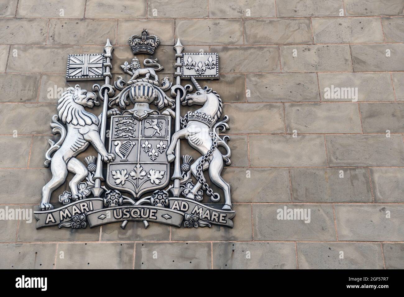 Les bras du Canada sur le mur d'un édifice à Dartmouth, au Canada Banque D'Images
