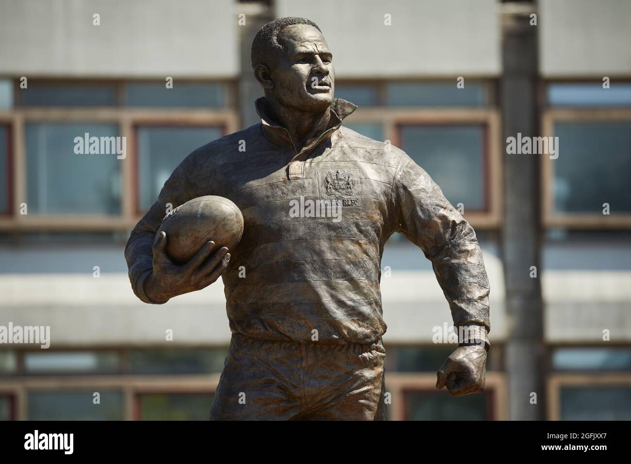 Centre-ville de Wigan, Lancashire, Statue de Wigan Warriors, joueur de rugby Billy Boston au centre-ville de Wigan Banque D'Images