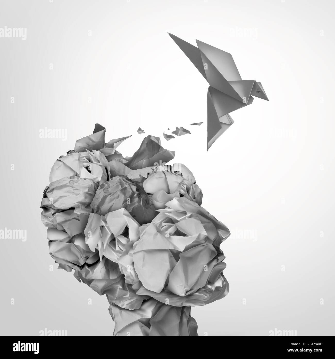 Succès de l'échec par les essais et les erreurs résultant en une idée d'affaires réussie comme des ordures de papier froissé avec un oiseau d'origami décollage. Banque D'Images