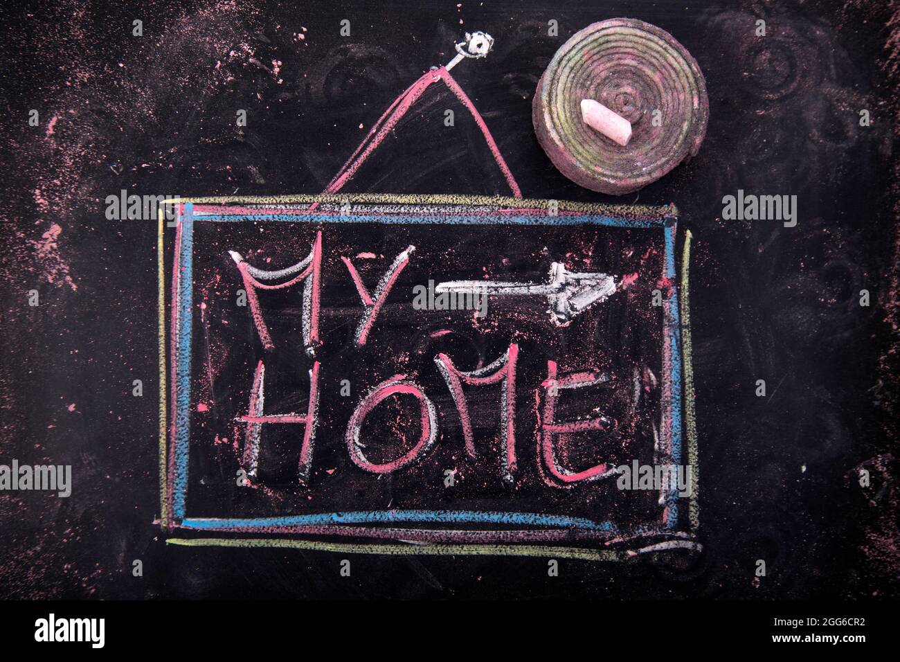 Soumission de la maison écrite, avec la craie sur le tableau noir Banque D'Images