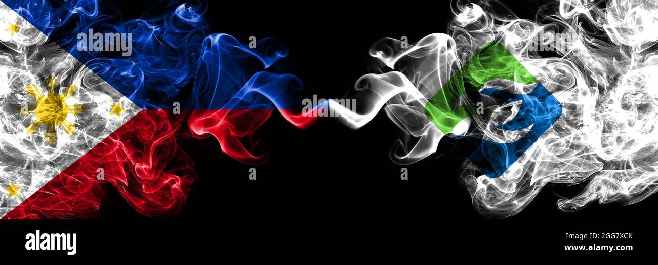 Philippines, Philippines vs Japon, Japonais, Eshi, soja, Hokkaido, soja, drapeaux de fumée sous-préfecture côte à côte. Banque D'Images