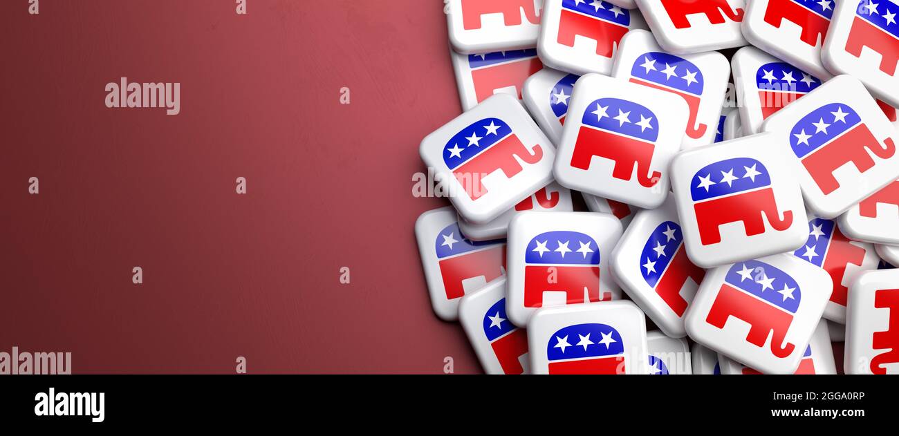 Logos des républicains du parti politique conservateur des États-Unis sur un tas sur une table. Copier l'espace. Format de bannière Web. Banque D'Images