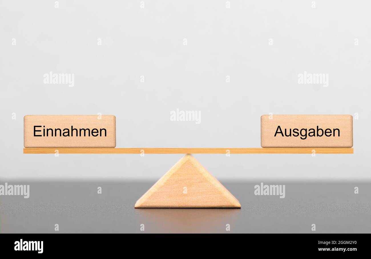 Revenus et charges en équilibre Banque D'Images