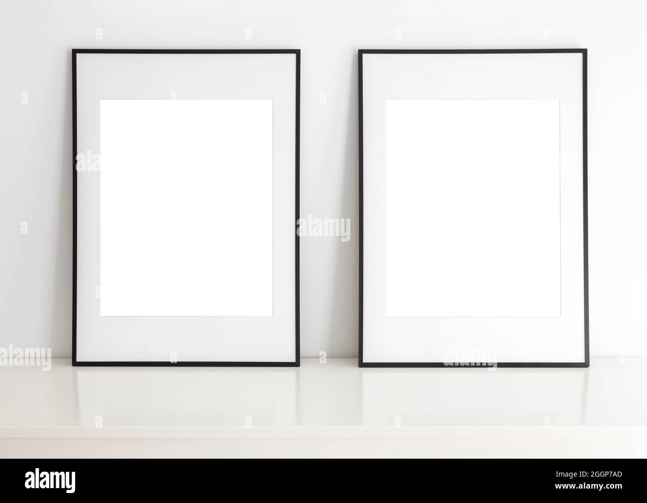 Cadres vides pour maquette, avec passe-passe blanc, mode portait debout. Banque D'Images
