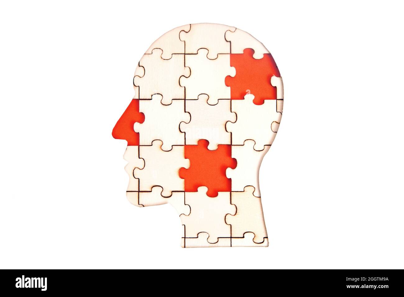 Puzzle en forme de tête humaine avec quelques pièces manquantes isolées sur blanc. Concept de trouble de traitement sensoriel. Banque D'Images