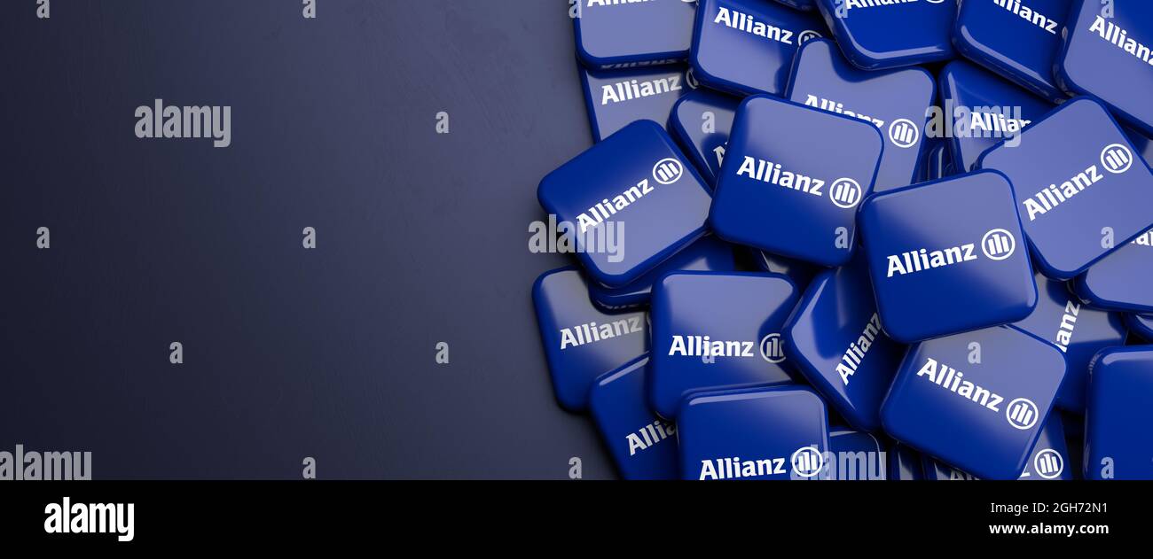 Logos du groupe allemand d'assurance et de services financiers Allianz sur un tas sur une table. Copier l'espace. Format de bannière Web. Banque D'Images