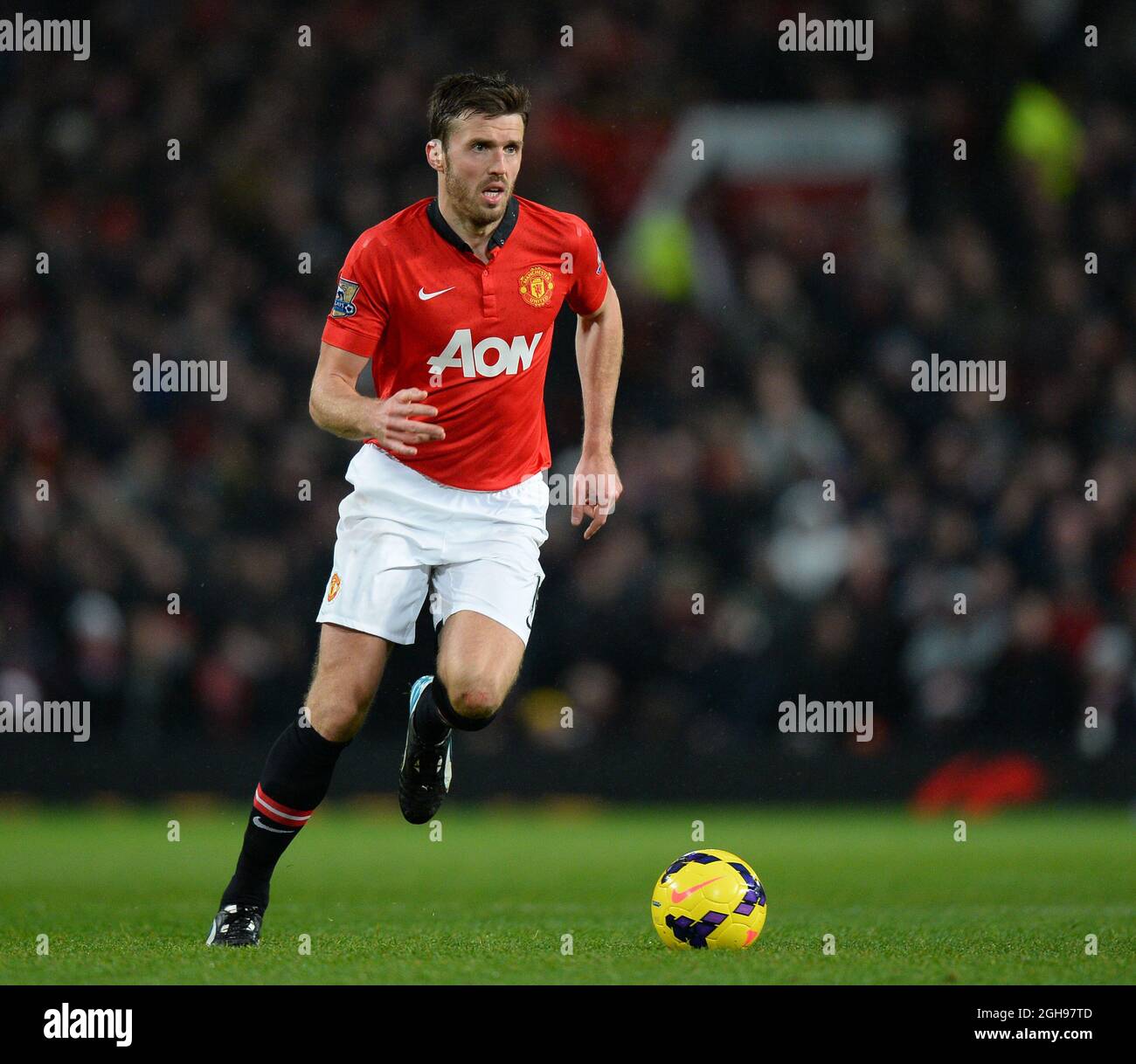 Michael Carrick de Manchester United en action pendant le match de la Barclays Premier League entre Manchester United et Tottenham Hotspur au Old Trafford à Manchester le 1er janvier 2014. Banque D'Images