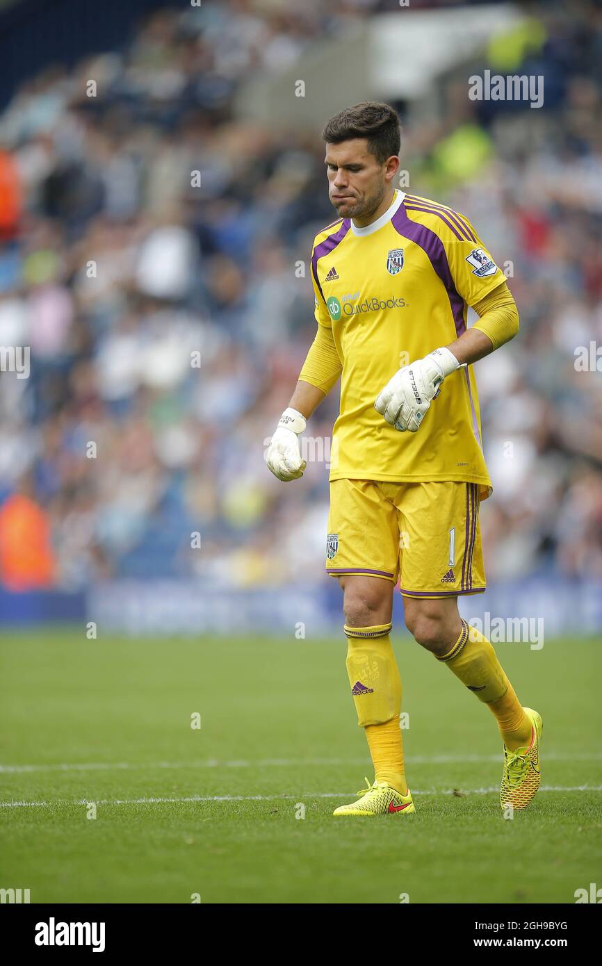 Dejection pour le gardien de but de West Bromwich Albion Ben Foster, qui a fumeré un coup de Kevin Mirallas pour le deuxième but du match d'Everton lors de leur match de football de la première Ligue anglaise aux Hawthorns à West Bromwich, centre de l'Angleterre, le 13 septembre 2014. Banque D'Images