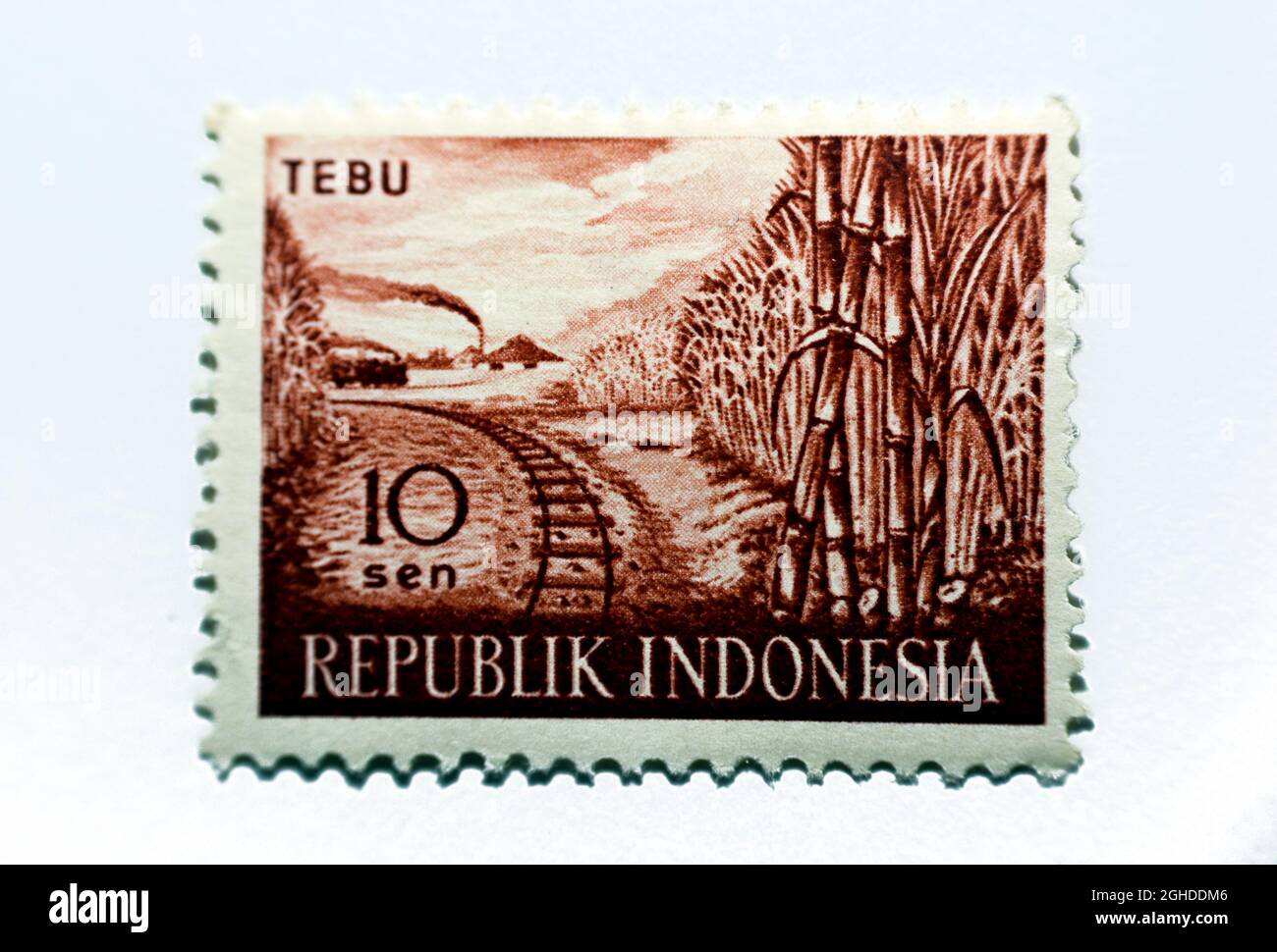 Un timbre-poste imprimé en Indonésie montre canne à sucre TEBU, série produits agricoles, vers 1960, rétro vintage, écrit République Indonésie, valeur Banque D'Images