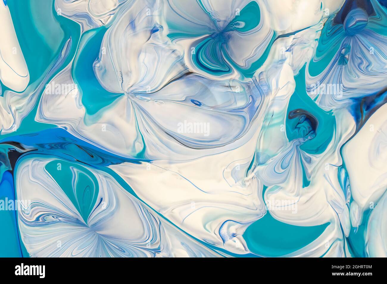 Image abstraite de diverses couleurs de peinture acrylique mélangées utilisation d'une technique de déverstage de peinture Banque D'Images