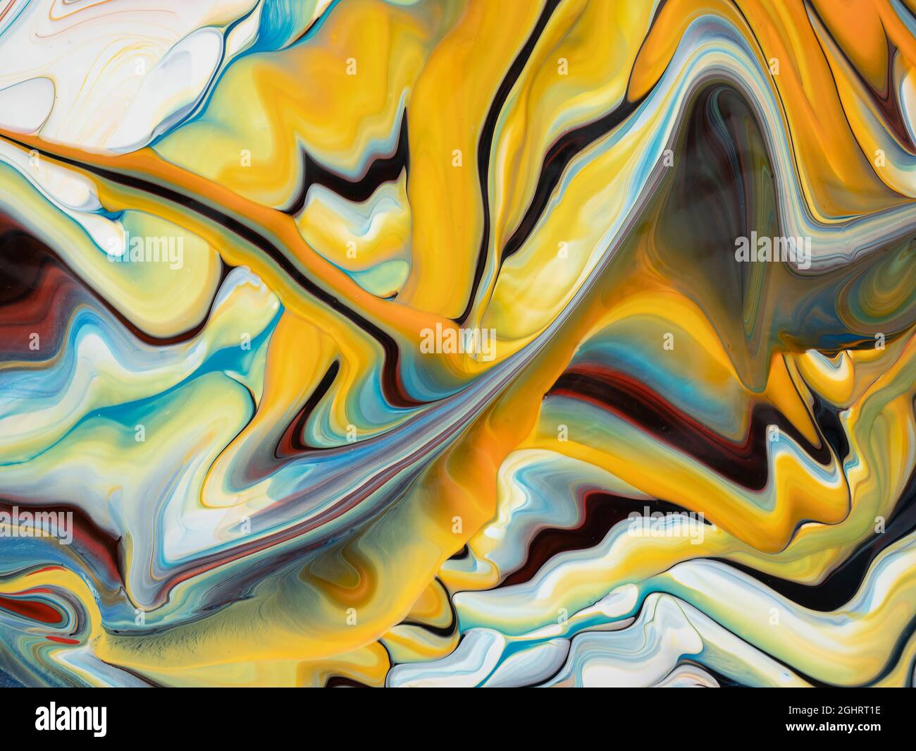 Image abstraite de diverses couleurs de peinture acrylique mélangées utilisation d'une technique de déverstage de peinture Banque D'Images