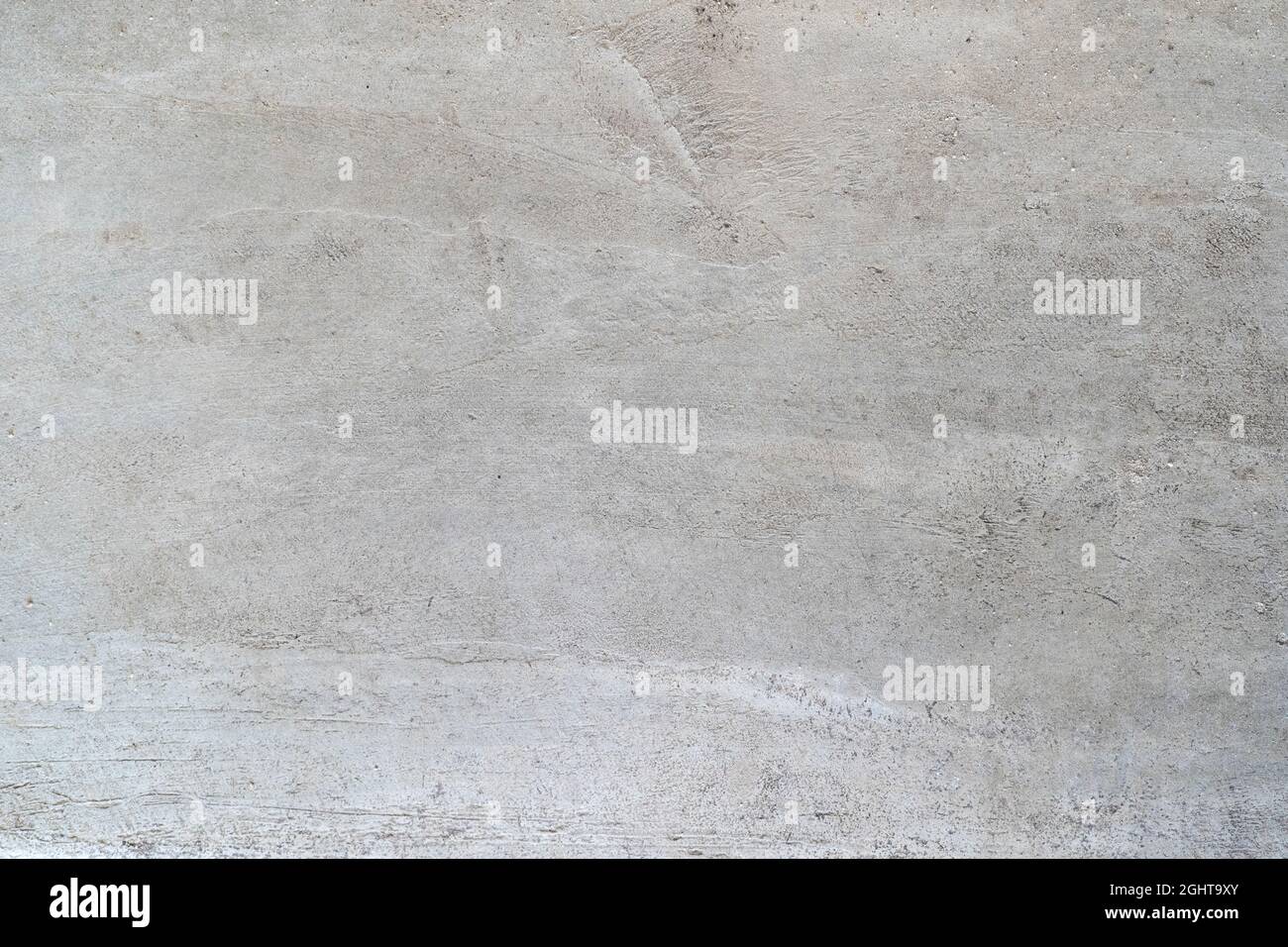 Texture de beton brute à partir d'un mur ou d'un sol. Revêtement intérieur moderne en ciment et papier peint. Banque D'Images