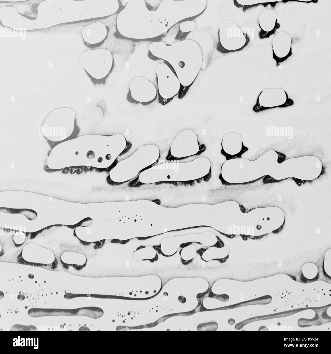 Résumé fond aquarelle dessiné à la main, taches aquarelles entre les verres humides. Objectif macro utilisé. Banque D'Images