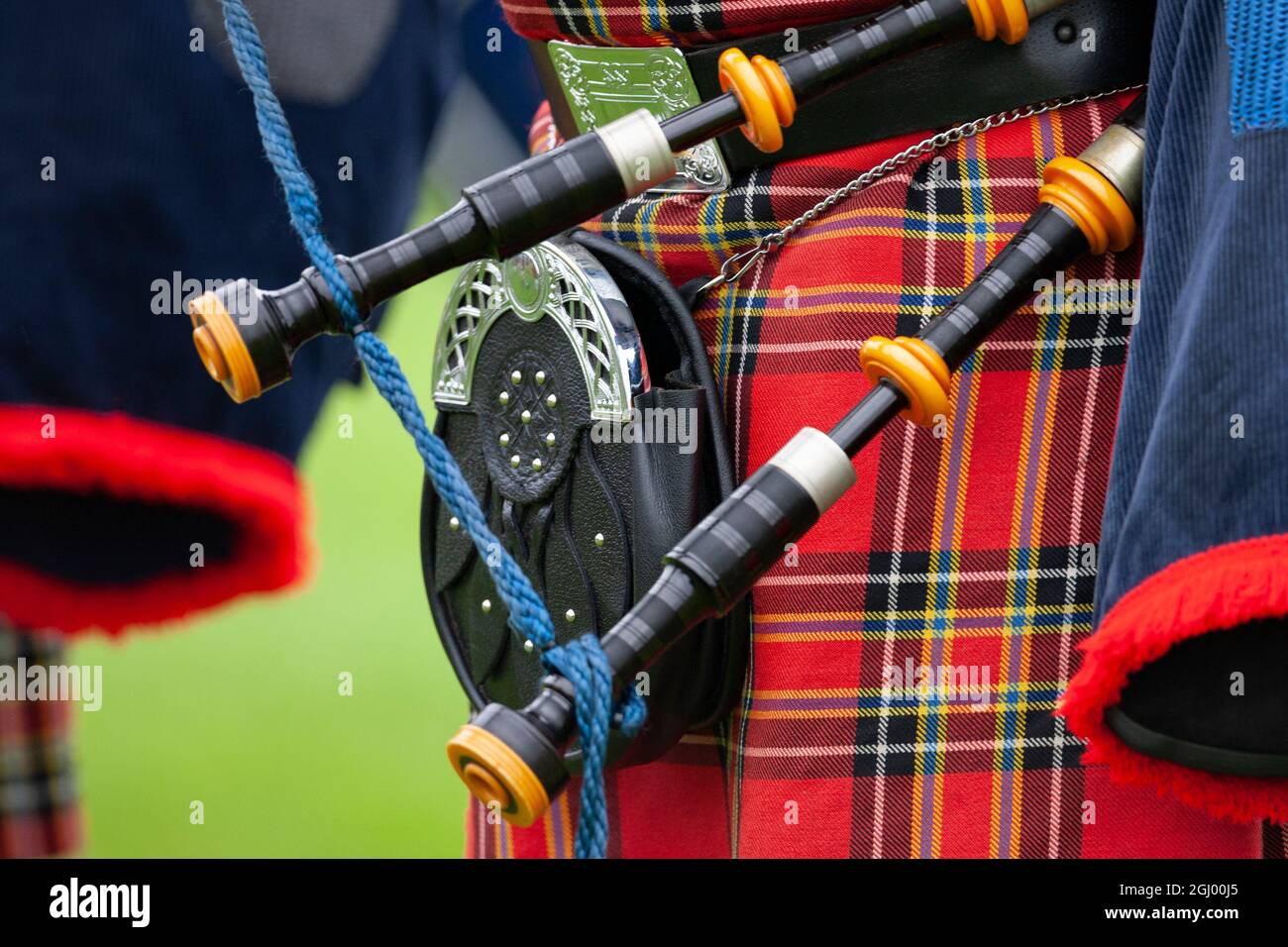 Piper au Cowal Gathering Highland Games près de Dunoon sur la péninsule de Cowal, en Écosse. Banque D'Images