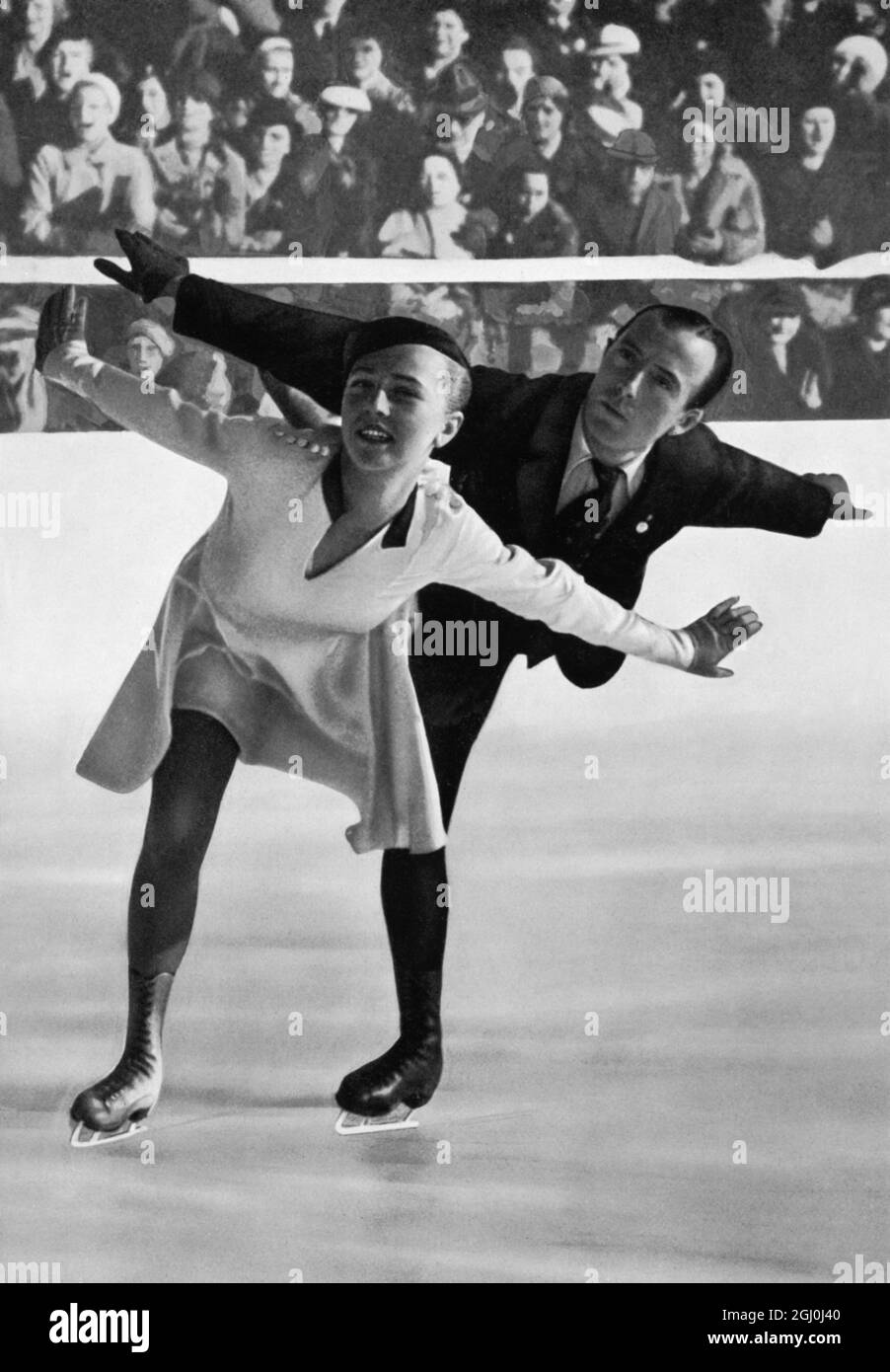 Maxie Herber et Ernst Baier (Allemagne) patinage en couple aux Jeux Olympiques de 1936. Ernst Baier (né le 27 septembre 1905 à Zittau, Saxe, Allemagne - décédé le 8 juillet 2001 à Garmisch, Bavière, Allemagne) était un patineur de la figure allemande. Il est devenu champion olympique par paires en 1936 avec Maxi Herber. Les patineurs ont également remporté plusieurs championnats du monde et d'Europe. ©TopFoto *** Légende locale *** Banque D'Images
