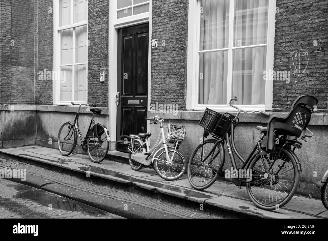 Europe, pays-Bas, la Haye.bicyclettes devant un bâtiment en brique. Banque D'Images