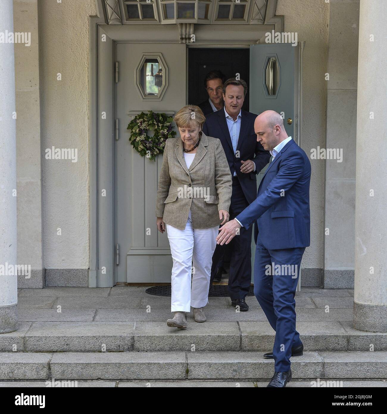 HARPSUND 20140609 , le Premier ministre néerlandais Mark Rutte, la chancelière allemande Angela Merkel, le Premier ministre suédois Fredrik Reinfeld et le Premier ministre britannique David Cameron , à droite, sont vus lors du sommet sur la résidence du gouvernement suédois Harpsund, au sud de Stockholm, le 9 juin 2014. M. Reinfeldt accueille lundi-mardi un résumé des discussions sur l'UE et le nouveau Parlement européen. Foto Anders Wiklund / TT / Kod 10040 Banque D'Images