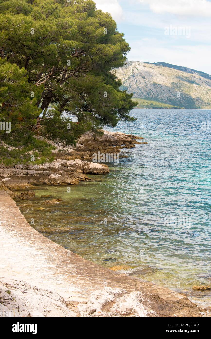Croatie, île de Hvar, Stari Grad. 'Plage', accès à l'eau créé. Banque D'Images