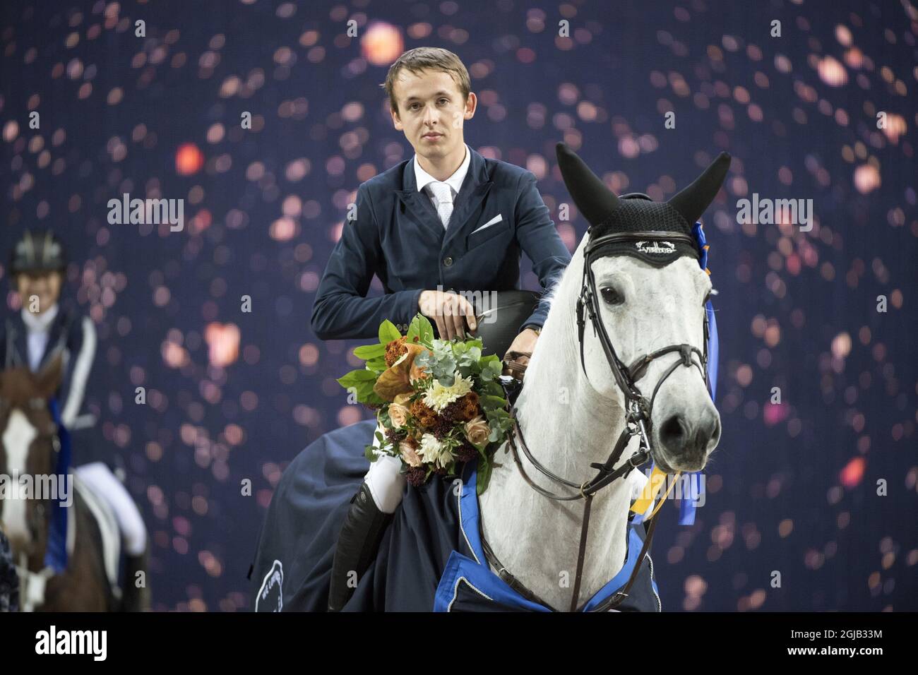 Bertram Allen célèbre sur son cheval Gin Chin van het Lindenhof après avoir remporté le Grand Prix deux tours de saut international lors du salon équestre international de Suède à Friends Arena à Solna/Stockholm. Photo: Jessica Gow / TT / code 10070 Banque D'Images