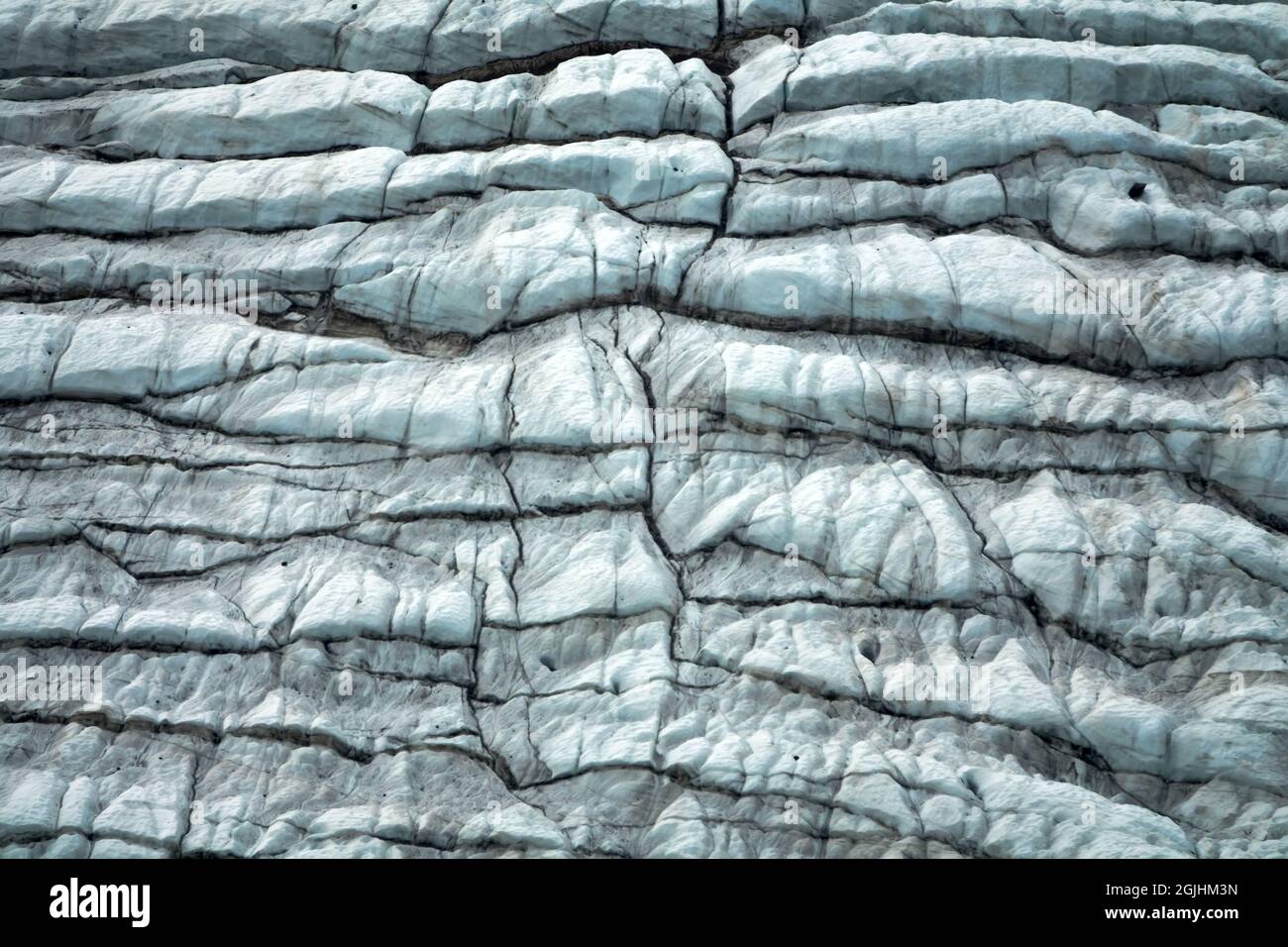 Glaciologie. Montagne (alpine) glacier. Surface des glaciers - dépôt de glace et stries de tapis Banque D'Images