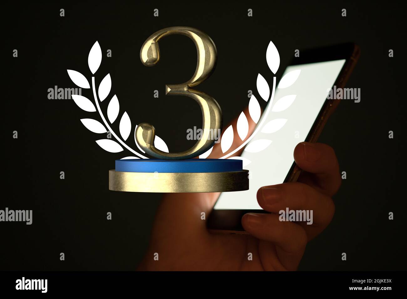 Modèle 3D d'un troisième trophée près d'un écran éclairé d'un smartphone en main sur fond sombre Banque D'Images