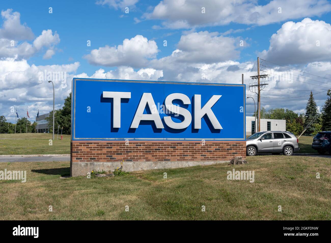 Gros plan de Task Sign à leur siège social à Kirkland, QC, Canada. Banque D'Images