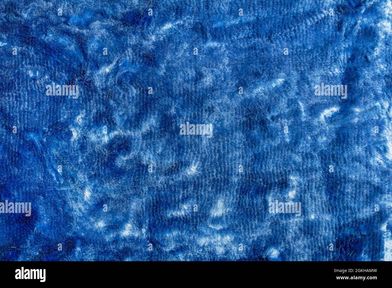 Toile de fond texture photo de tissu velours bleu. Banque D'Images