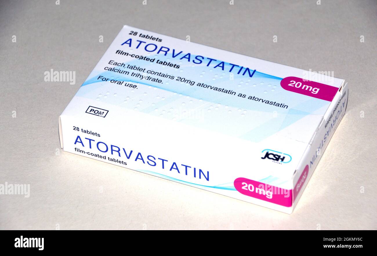 Une boîte de 28, 20mg comprimés pelliculés d'Atorvastatine (Lipitor) 'Statin' fabriqués par JCSH prescrits pour réduire le cholestérol, Angleterre, Royaume-Uni. Banque D'Images