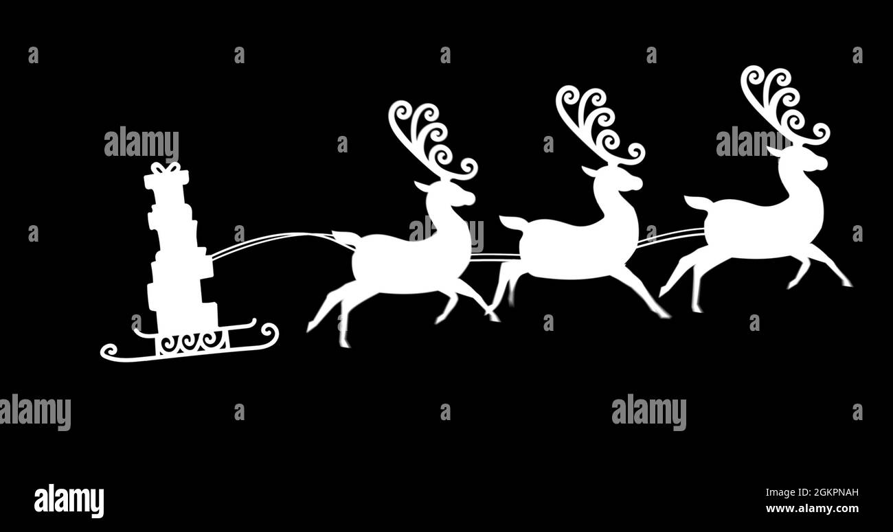 Image numérique de la silhouette des boîtes-cadeaux de noël tirées par les rennes contre le dos noir Banque D'Images